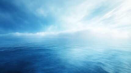 Obraz premium Serene ocean scene featuring blue water and a cloudy sky