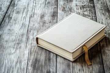 Fototapeta premium Elegant Grey Book on Wooden Table