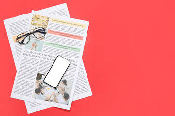 Obraz premium Newspapers, eyeglasses and mobile phone on red background. Top view