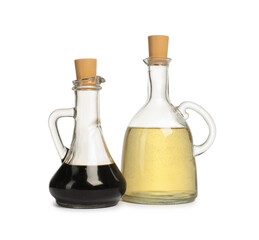 Salad dressings in bottles isolated on white