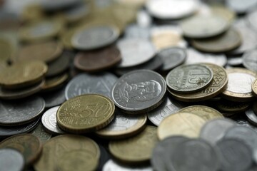 Big pile of different coins from various currencies and different countries around the world....