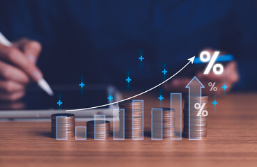Interest rate and dividend concept, Businessman is calculating income and return on investment in percentage. income, return, retirement, compensation fund, investment, dividend tax, stock market