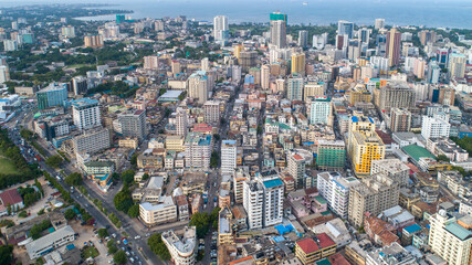 A breathtaking aerial drone shot of Dar Es Salaam, capturing the city's vibrant skyline, bustling...