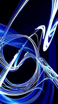 Close-up, light trails in wave motion, blue and white, moonlit night, magical and mysterious. Vertical video backgrounds
