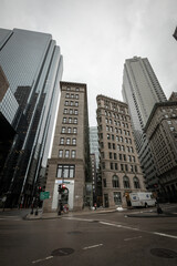 Boston, MA, USA - Dec 24, 2020 - A mix of modern glass skyscrapers and historic architecture in downtown Boston, showcasing the city&rsquo;s evolving skyline, captured during Covid-19 pandemic 