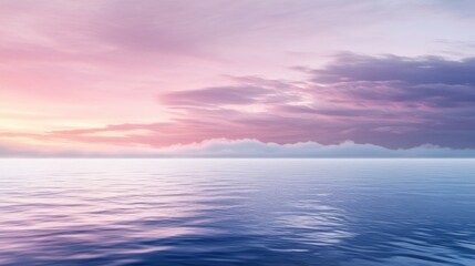 Beautiful pastel colored sky reflecting upon calm open ocean waters