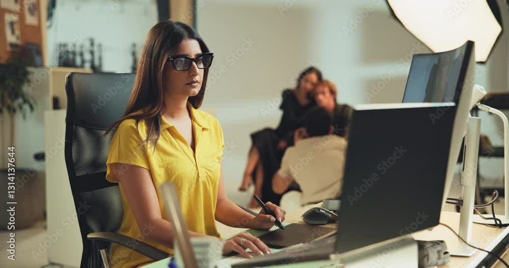 Poster woman, media or photo editor on computer in studio for checking image, design or creative magazine. 