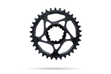 Black round bicycle chainring against white isolated background, floating above the surface. Professional bicycle part.