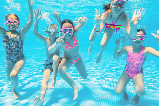 Children play in  pool at the resort