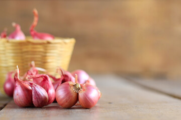 red onion on wooden table background