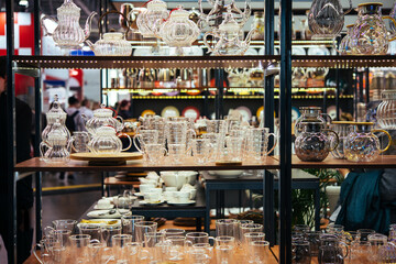 Different teapots and cups on sale for a restaurant of hotel business.