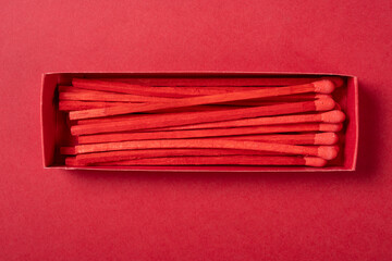 top view red matchbox on a red background