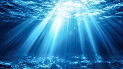 Sunlight beaming through deep blue ocean water creating magical underwater scene