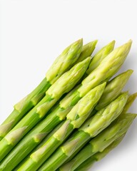 Fototapeta premium Asparagus vegtables in string season on white background, Top Down View of Neatly Aligned Fresh Green Asparagus for Culinary Use.