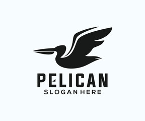 Flat style flying pelican bird logo