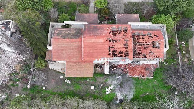 Aerial View of Destruction in Kibbutz Be&rsquo;eri


A heartbreaking aerial view of Kibbutz Be&rsquo;eri showing widespread destruction following the October 7th attack. The burned and shattered homes reflect the