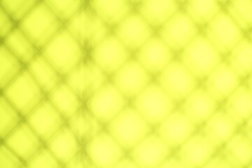 Light and shadows falling on yellow background