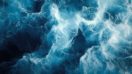 Dynamic ocean waves with churning white foam and deep blue water