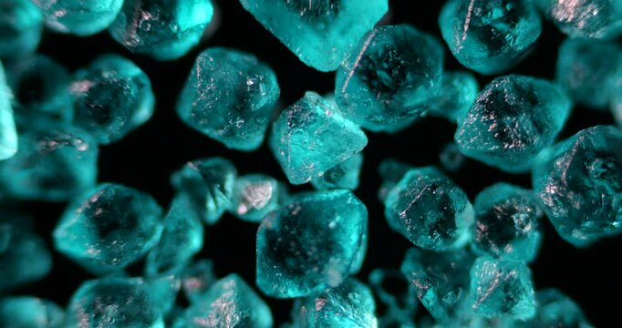 Laboratory footage showing hydrated nickel sulfate crystal structures under high magnification with industrial context