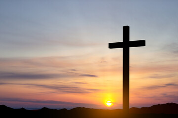 Good Friday. Friday before Easter. Christian cross against the sunset