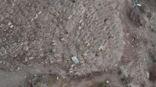 Nabi Musa Shrine in the Judean Desert top down view

An aerial view of the historic Nabi Musa shrine, a significant Islamic pilgrimage site in the Judean Desert, surrounded by vast arid hills and dram