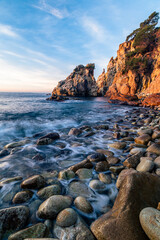 Rocky morning on the coast of the sea