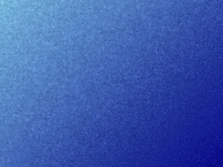 Elegant textured background featuring a smooth gradient of blue hues, from light to deep blue.