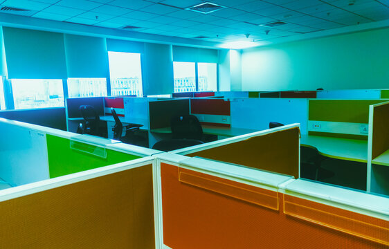 Interior of a modern office with colorful walls and floor. Nobody inside.