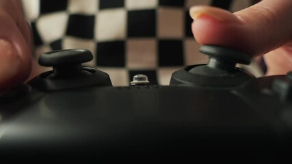 Hands of gamer holding modern console close-up, girl playing video games. High quality 4k footage