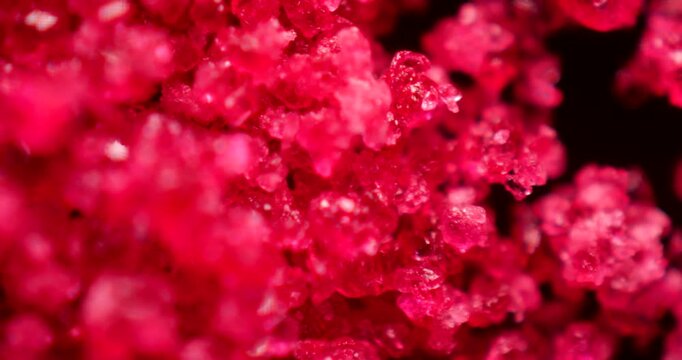 Detailed 100x analysis of CoCl2 showing pink-blue color change, hexagonal crystals, and hygroscopic properties. Essential for humidity sensors and electrochemistry.