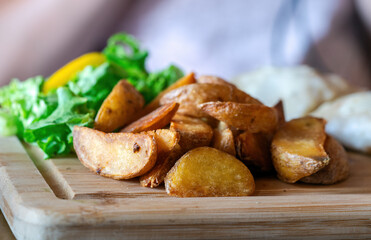 Fried Potato Wedges on a Plate