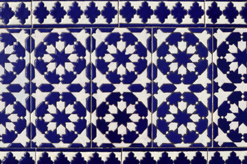 Traditional Spanish ceramic tiles for outdoor decoration, blue and white background, Tarifa, Spain