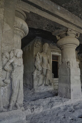 Fototapeta premium Ellora Caves in Maharashtra India, which is a UNESCO World Heritage Site, are the world's largest monolithic excavation of 34 Hindu, Buddhist and Jain temples carved into a basalt cliff. 