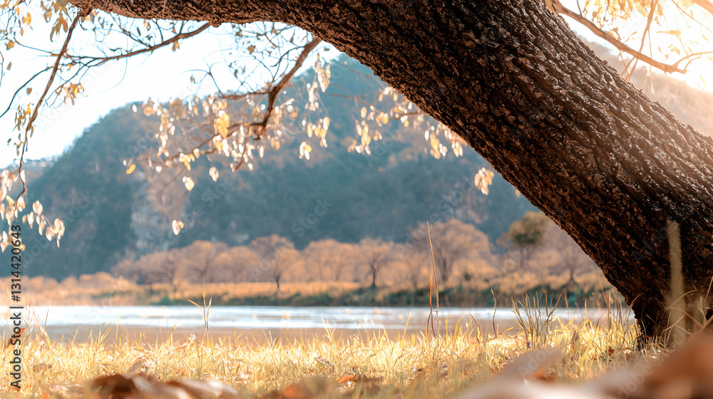 Poster a large tree frames a serene view of a lake and mountains