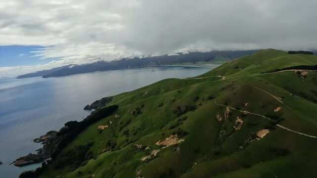 POV Helicopter aerial flying over Pepin Island, near Delaware bay, New Zealand