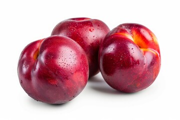 Fototapeta premium Trio of red plums on white background. Neural network AI generated
