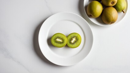 Juicy Kiwis and Fresh Pears on White Plate