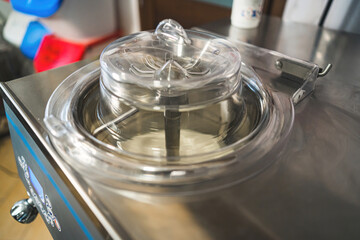 Ice cream production process - inside of an hand-made ice cream parlor. High quality photo