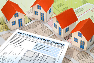 Building permit concept written in French - PERMIS DE CONSTRUIRE - Building activity with vacant land - Construction industry with a cadastral map, General Urban Planning and zoning regulations