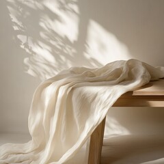 Shadowed White Linen Softly Lay On Wooden Surface.
