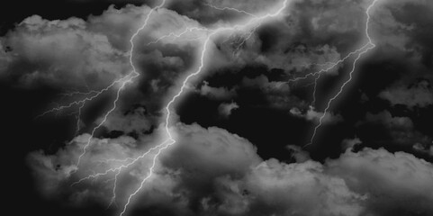 Thunder, lightnings and rain on a stormy summer night in black and white. Lightning bolts in the sky at night. Different lightning bolts isolating on black.  Bright light flare and sparks .
