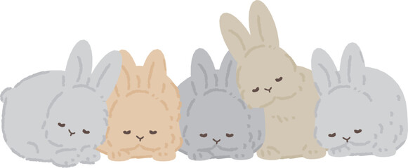 寄り添って眠るウサギたち