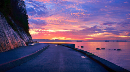 West Coast Dramatic Sunset. Sunset over the sea. Stanley Park, Vancouver, British Columbia, Canada