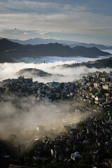 Sea of clouds over hilly Aizawl, capital city of Mizoram, India