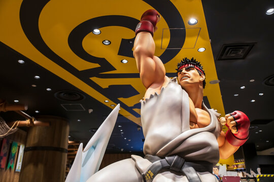 Statue of Ryu figure with posing Shoryuken at capcom shop, Osaka