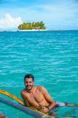 Tourist enjoying crystal clear water in siargao island, philippines