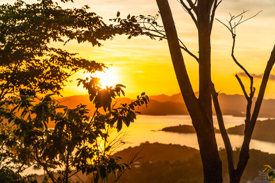 Golden sunset overlooking coron island from mount tapyas viewpoint in the philippines
