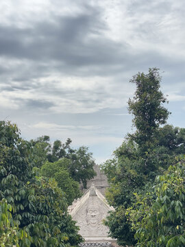 Historic buildings of Yogyakarta's Taman Sari area with a view of the forest and the sky