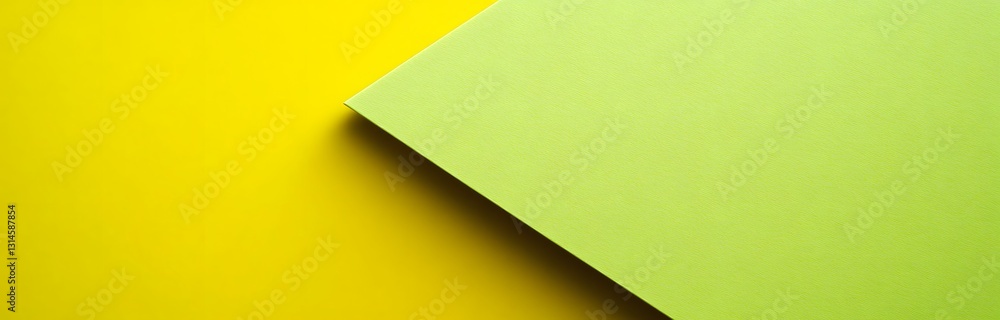 Poster geometric forms in yellow and green create a striking background. the colors are vibrant and the com