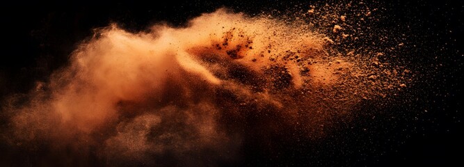 A warm-toned explosion of cinnamon powder frozen mid-air on an isolate background